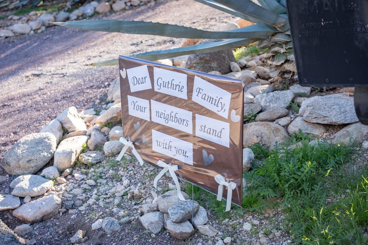 A sign is posted at the house of Nancy Guthrie on February 3, 2026 in Catalina, Arizona.Credit: Getty Images