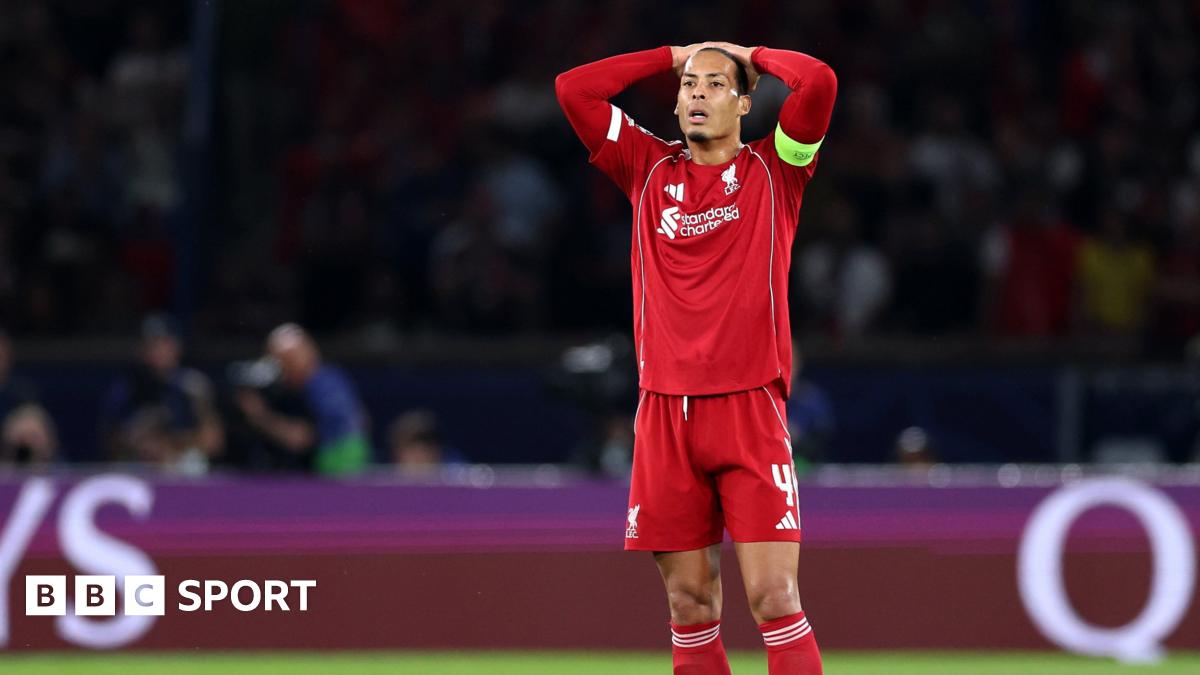 Liverpool's players react after losing to Paris St-Germain in the Champions League