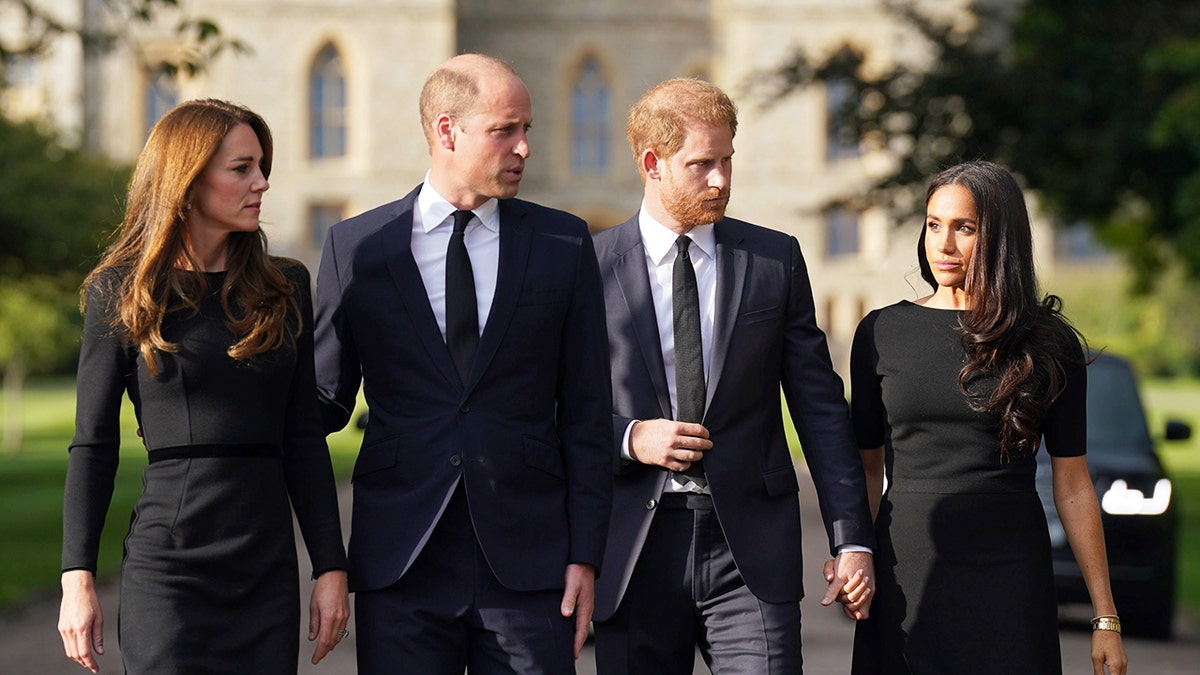Catherine Princess of Wales Prince William Prince Harry and Meghan Duchess of Sussex walking outdoors at Windsor Castle