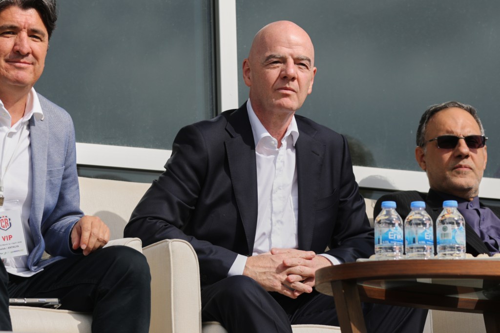 FIFA President Gianni Infantino watches a soccer match.