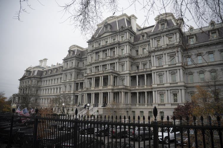 Stately, ornate, granite building.