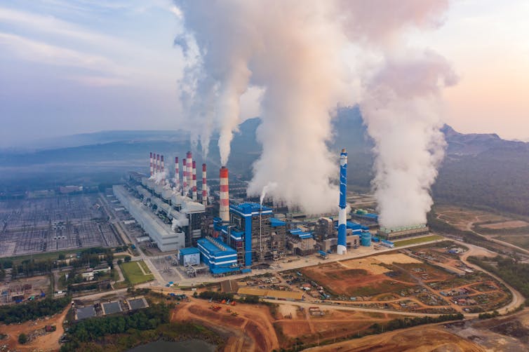 Smoke billows from chimneys at the Mae Moh coal power plant in Thailand.