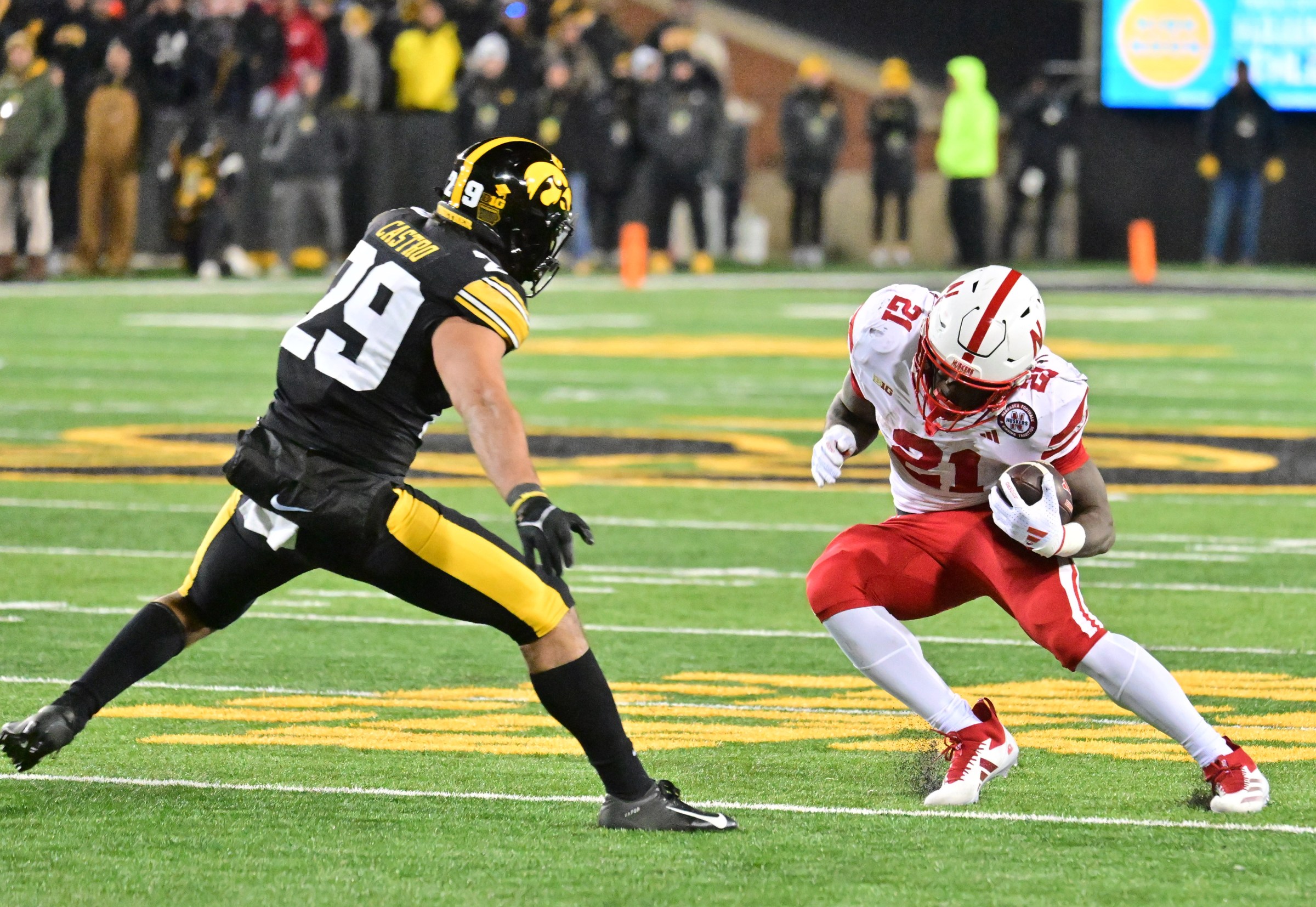 IOWA CITY, IA - NOVEMBER 29: Iowa linebacker Sebastian Castro (29) gets ready to tackle Nebraska running back Emmett Johnson (21) during a college football game between the Nebraska Cornhuskers and the Iowa Hawkeyes, on November 29, 2024, at Kinnick Stadium, Iowa City, IA. (Photo by Keith Gillett/IconSportswire)