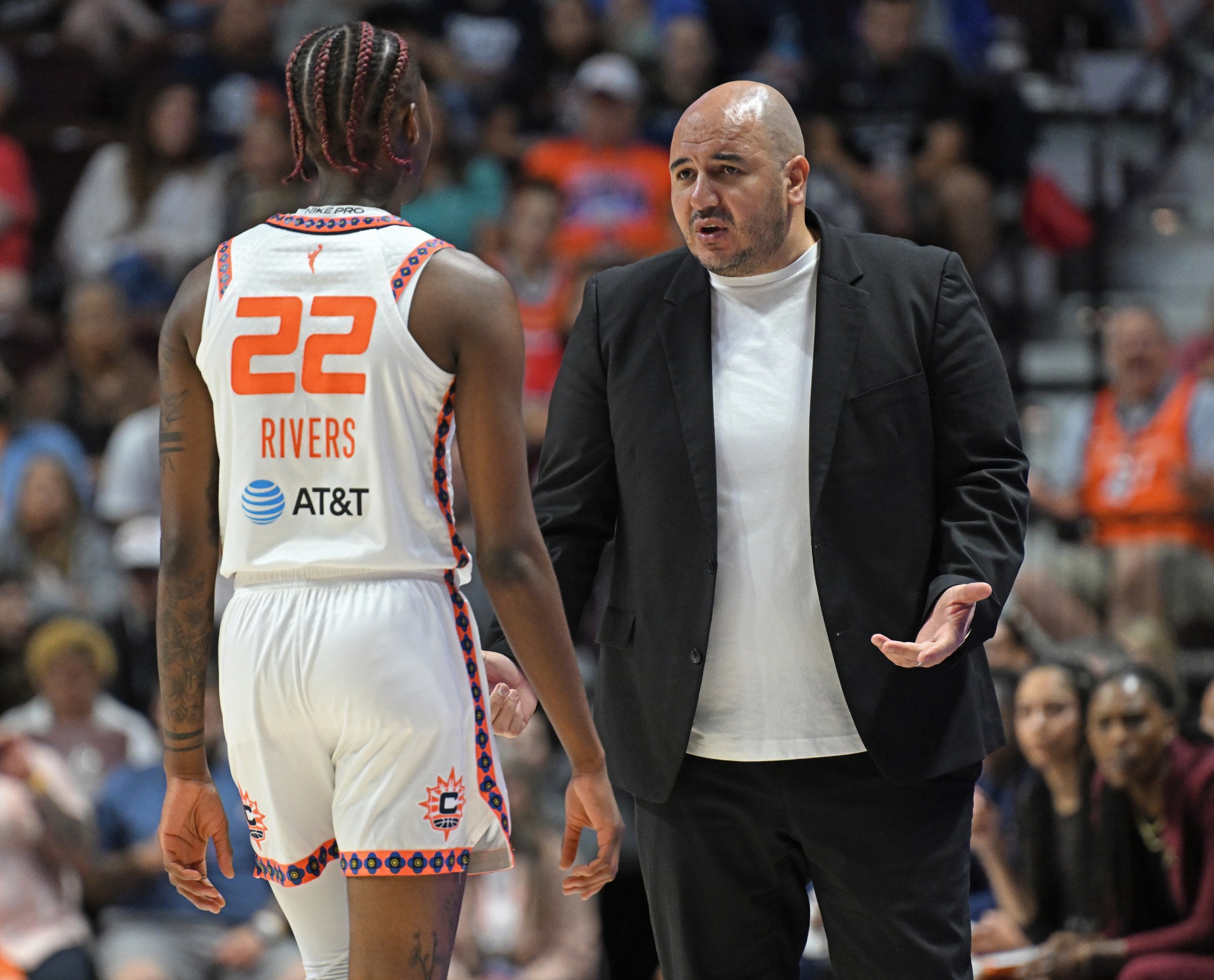 UNCASVILLE, CONNECTICUT - SEPTEMBER 6: Head coach Rachid Meziane of the Connecticut Sun speaks with Saniya Rivers #22 during play against the Phoenix Mercury in the first half at Mohegan Sun Arena on September 6, 2025 in Uncasville, Connecticut. NOTE TO USER: User expressly acknowledges and agrees that, by downloading and or using this photograph, User is consenting to the terms and conditions of the Getty Images License Agreement. (Photo by Sean D. Elliot/Getty Images)