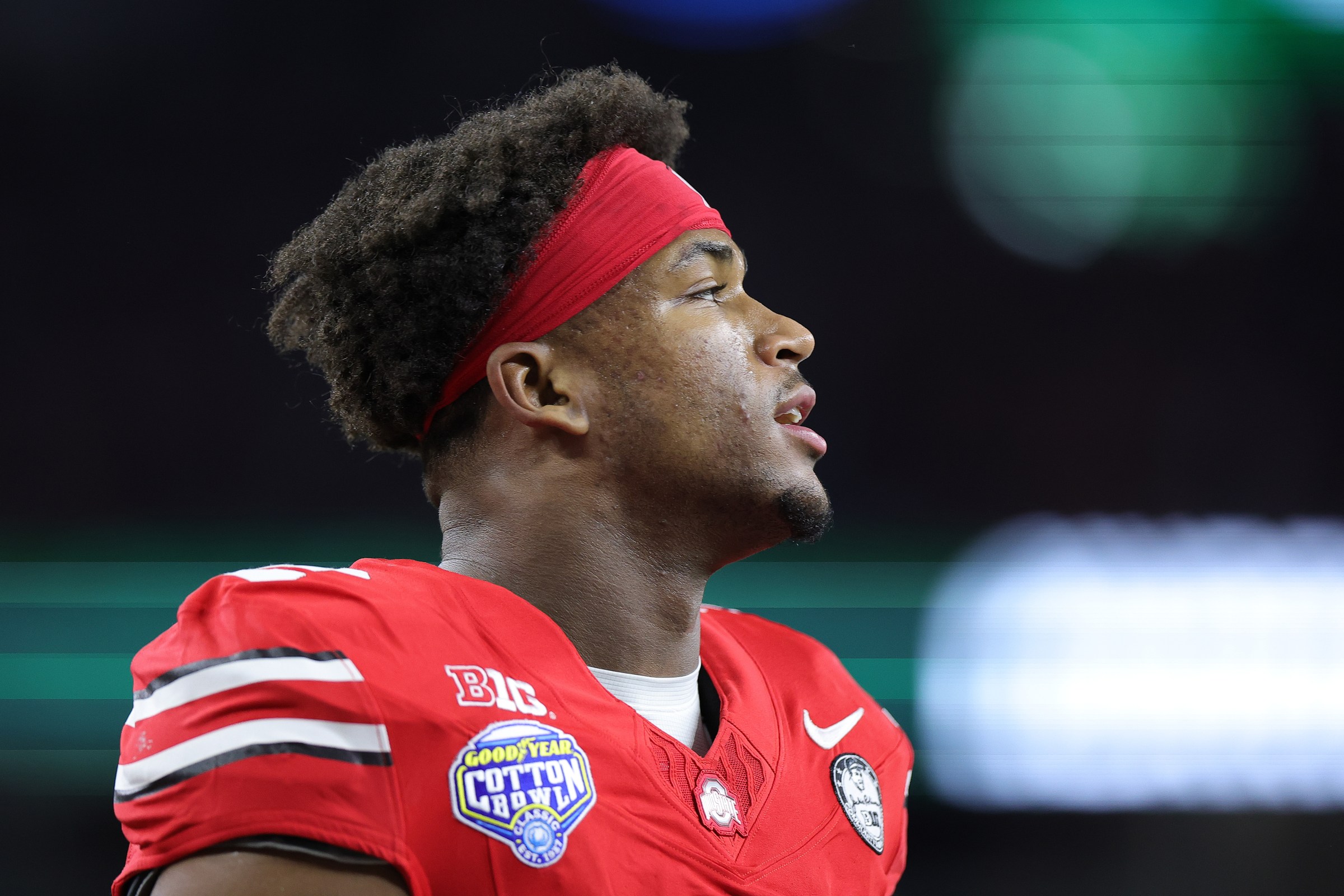 ARLINGTON, TEXAS - DECEMBER 31: Caleb Downs #2 of the Ohio State Buckeyes looks on prior to a game against the Miami Hurricanes during the 2025 College Football Playoff Quarterfinal at the 90th Goodyear Cotton Bowl Classic at AT&T Stadium on December 31, 2025 in Arlington, Texas. (Photo by Alex Slitz/Getty Images)