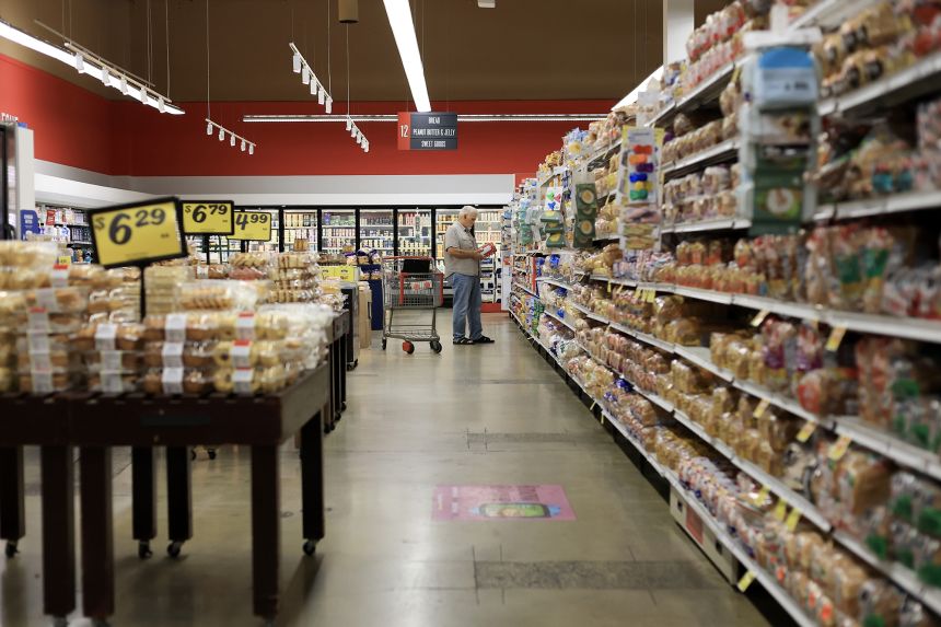 A customer shops in a grocery store on March 11, 2026 in Miami.