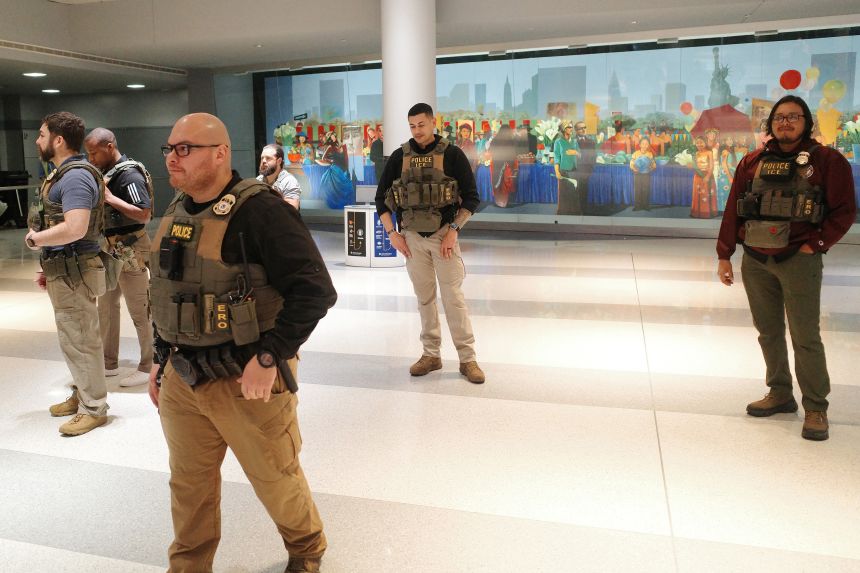 Immigration and Customs Enforcement agents patrol John F. Kennedy International Airport in New York on March 27.