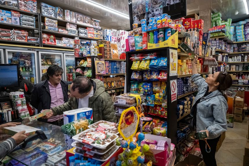 People shop at a supermarket in downtown Tehran, Iran, on April 11, amid direct Iran-US talks taking place in Islamabad, Pakistan.