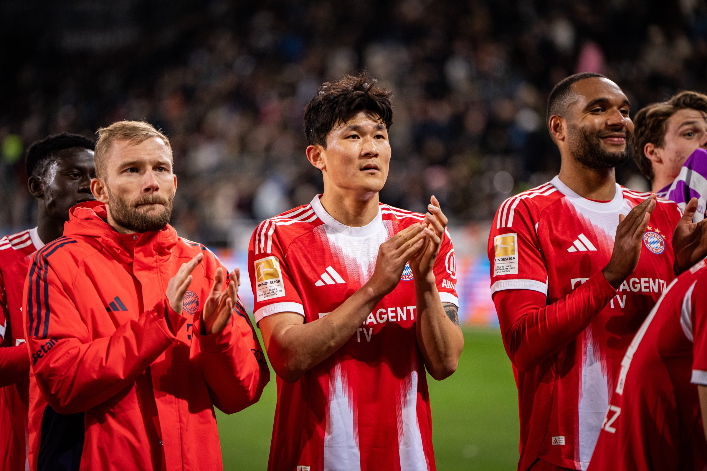 HAMBURG, GERMANY - APRIL 11: Minjae Kim and Konrad Laimer of FC Bayern Muenchen celebrate the team’s victory in the Bundesliga match between FC St. Pauli and FC Bayern München at Millerntor Stadium on April 11, 2026 in Hamburg, Germany. (Photo by S. Mellar/FC Bayern via Getty Images)