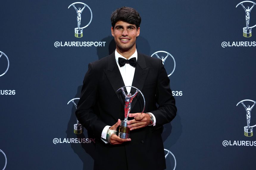 Carlos Alcaraz poses with the Laureus World Sportsman of the Year award during the Laureus World Sports Awards Madrid 2026 Winners Walk on April 20.
