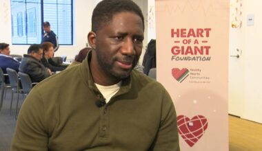 6-foot-8 "chief inspiration officer" survives devastating heart condition, now saves lives with blood pressure screenings
