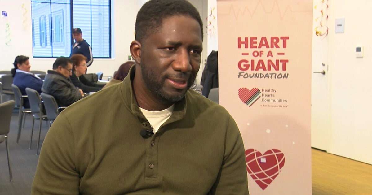 6-foot-8 "chief inspiration officer" survives devastating heart condition, now saves lives with blood pressure screenings