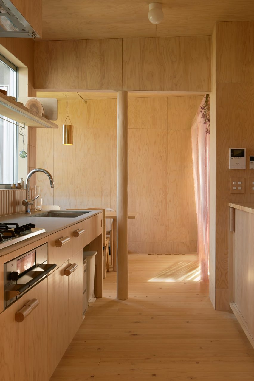 Kitchen interior at the House in Takahatayama by HYG Architects