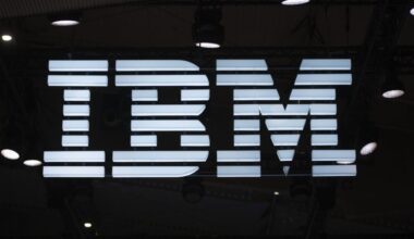 A large IBM logo at a conference exhibition.