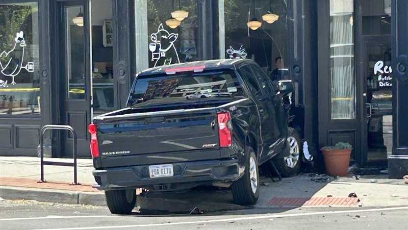 Crash at Covington intersection leaves 2 injured, butcher shop damaged
