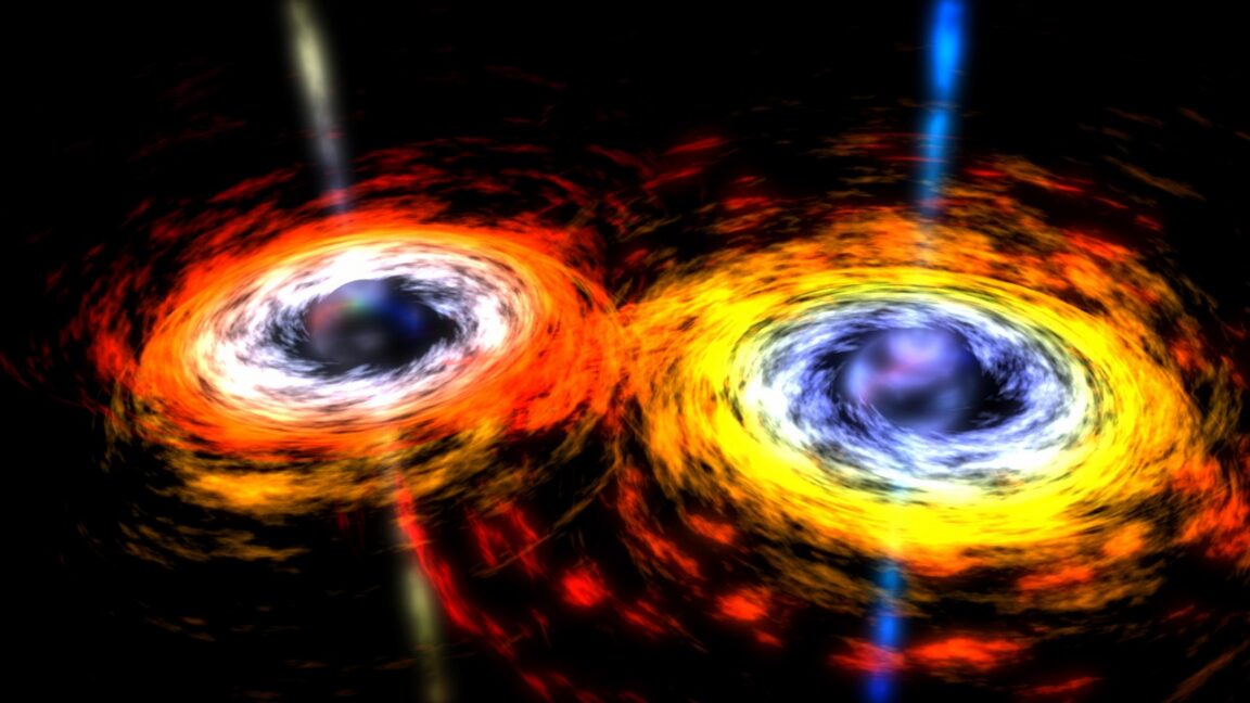Image of two dark spheres surrounded by bright materail, swirling in towards a collision.