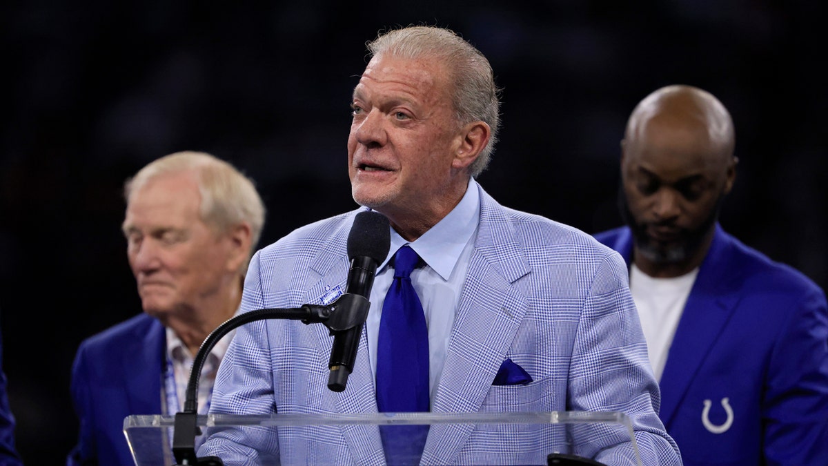 Indianapolis Colts owner Jim Irsay speaking at Lucas Oil Stadium during halftime ceremony