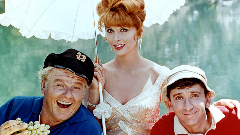 Skipper, Ginger, and Gilligan, smiling together