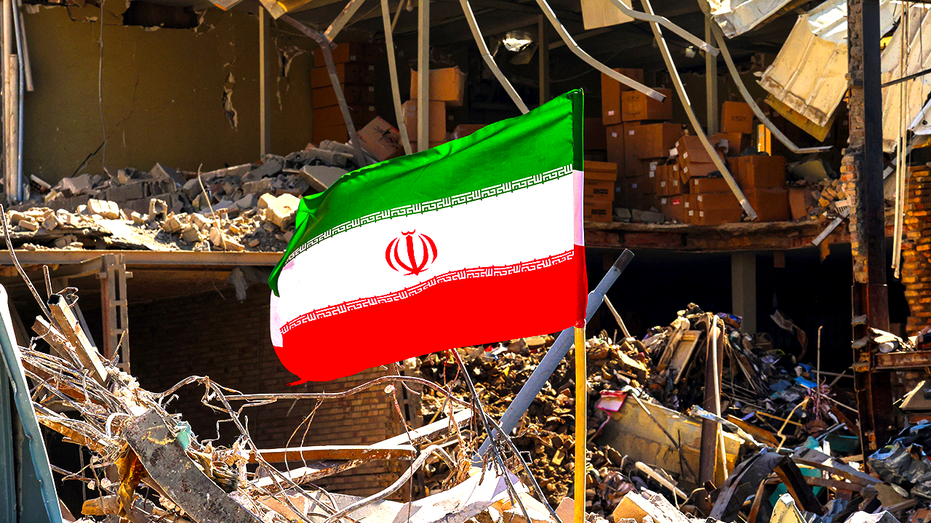 Iran flag in rubble and debris
