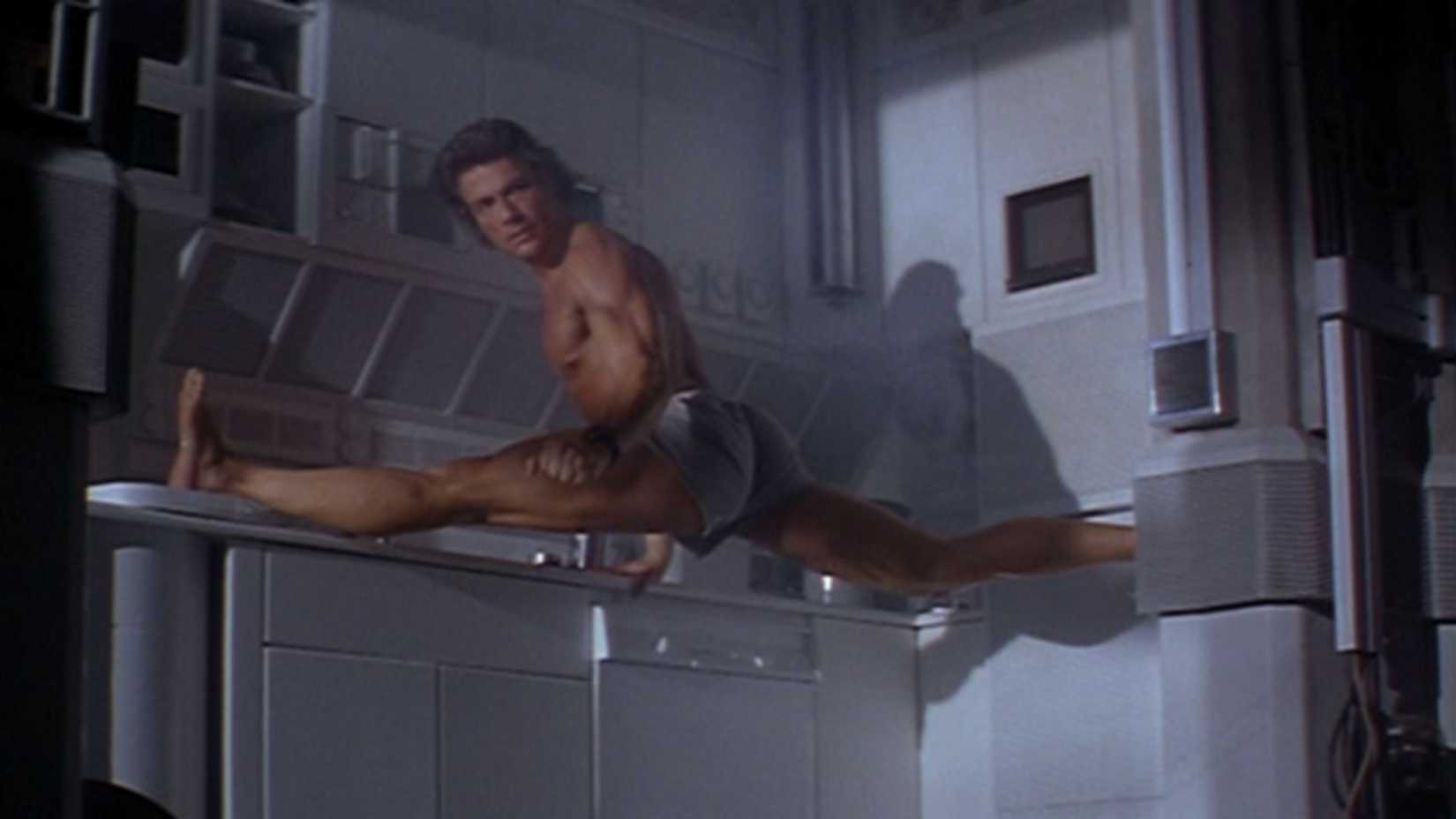 Jean-Claude Van Damme as Agent Max Walker doing the splts in Timecop