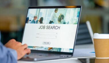 Close up of a Businessman looking at a job search recruitment web page.