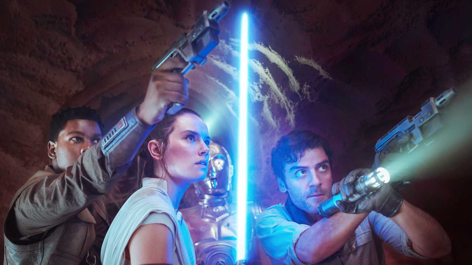 John Boyega as Finn, Daisy Ridley as Rey, Oscar Isaac as Poe, and Anthony Daniels as C-3PO in The Rise of Skywalker
