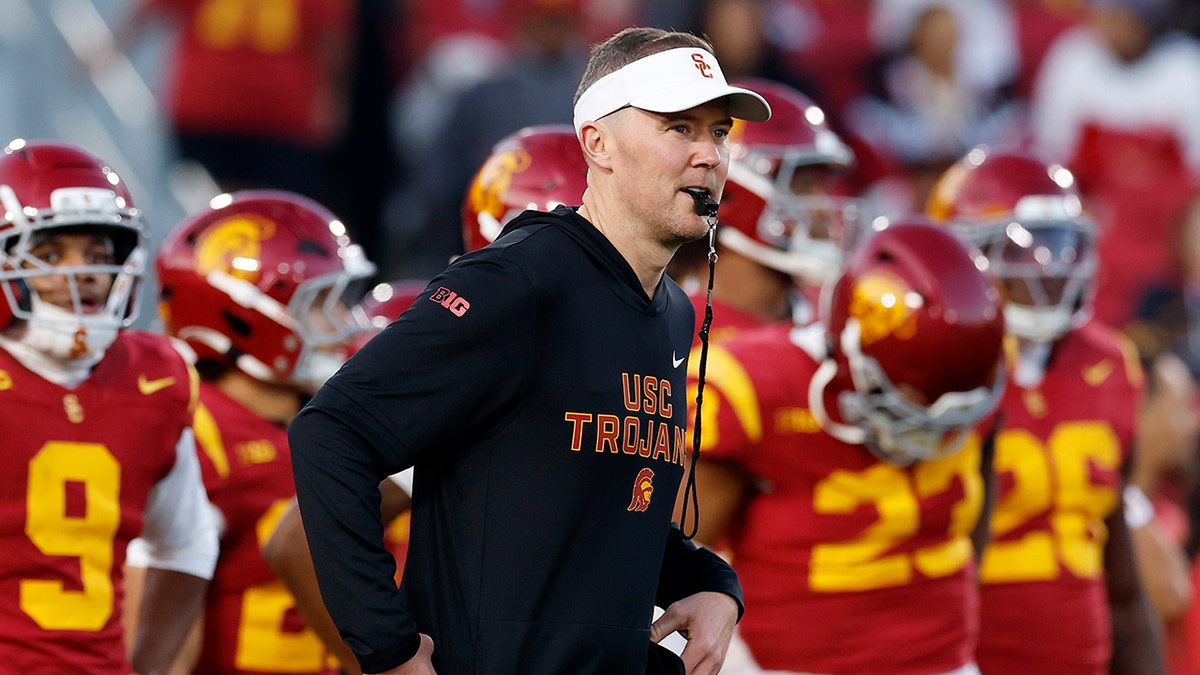 Head coach Lincoln Riley of the USC Trojans standing on the sidelines at Los Angeles Memorial Coliseum