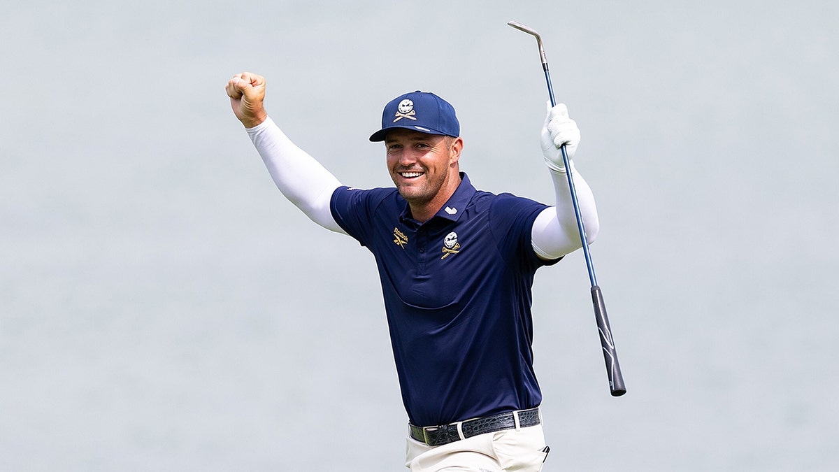 Captain Bryson DeChambeau reacts after chipping onto the fourth green at Aramco LIV Golf Singapore