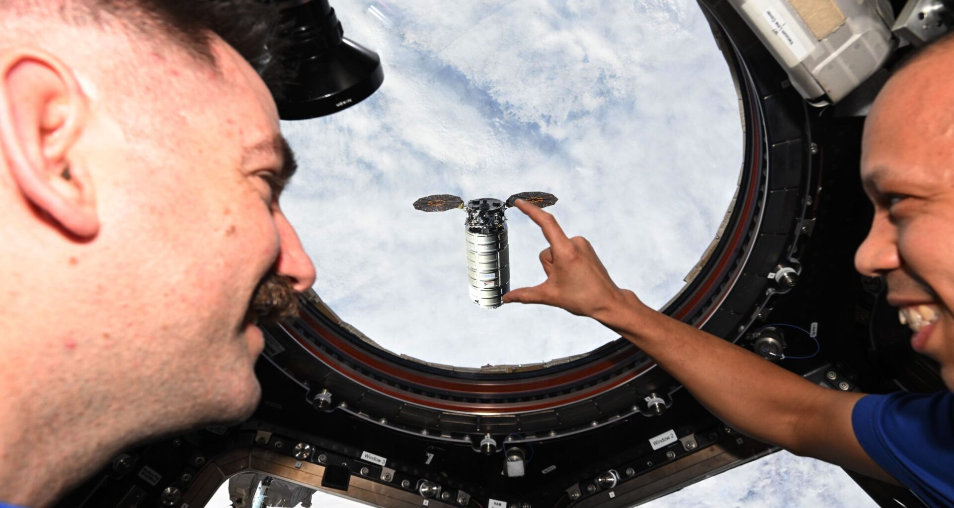 NASA astronauts joke around with an optical illusion on the ISS photo of the day for April 15, 2026