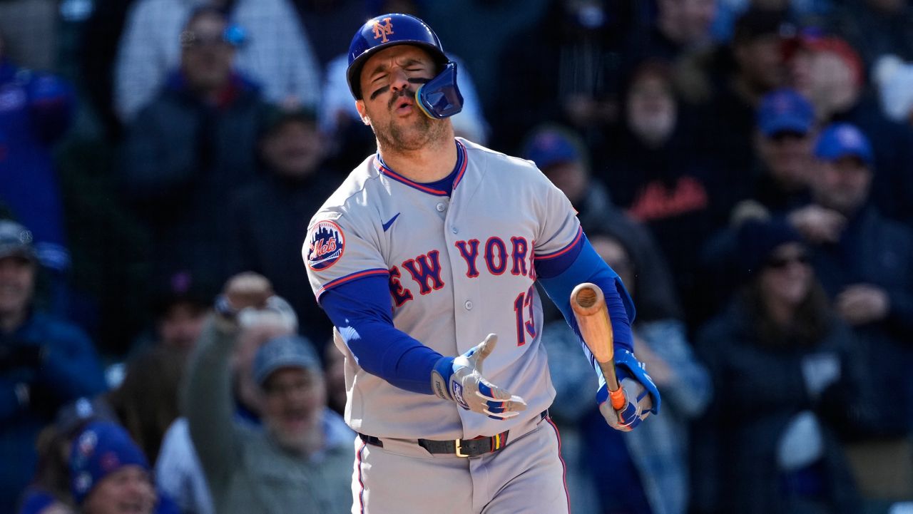 New York Mets' Luis Torrens reacts after striking out swinging during the 10th inning of a baseball game against the Chicago Cubs in Chicago, Sunday, April 19, 2026. (AP Photo/Nam Y. Huh)