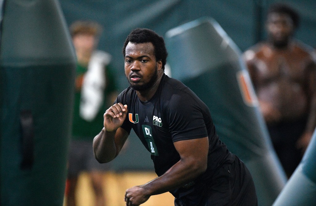 Miami defensive lineman Rueben Bain Jr. works out during the school's NFL Pro Day.