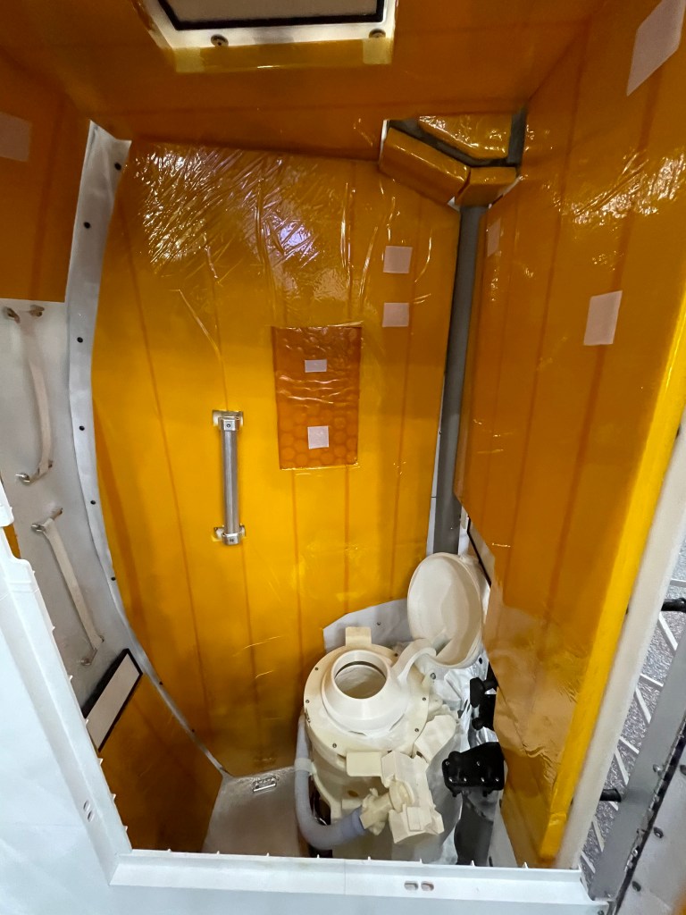 Mock-up of Orion's toilet used for training at the Johnson Space Center.