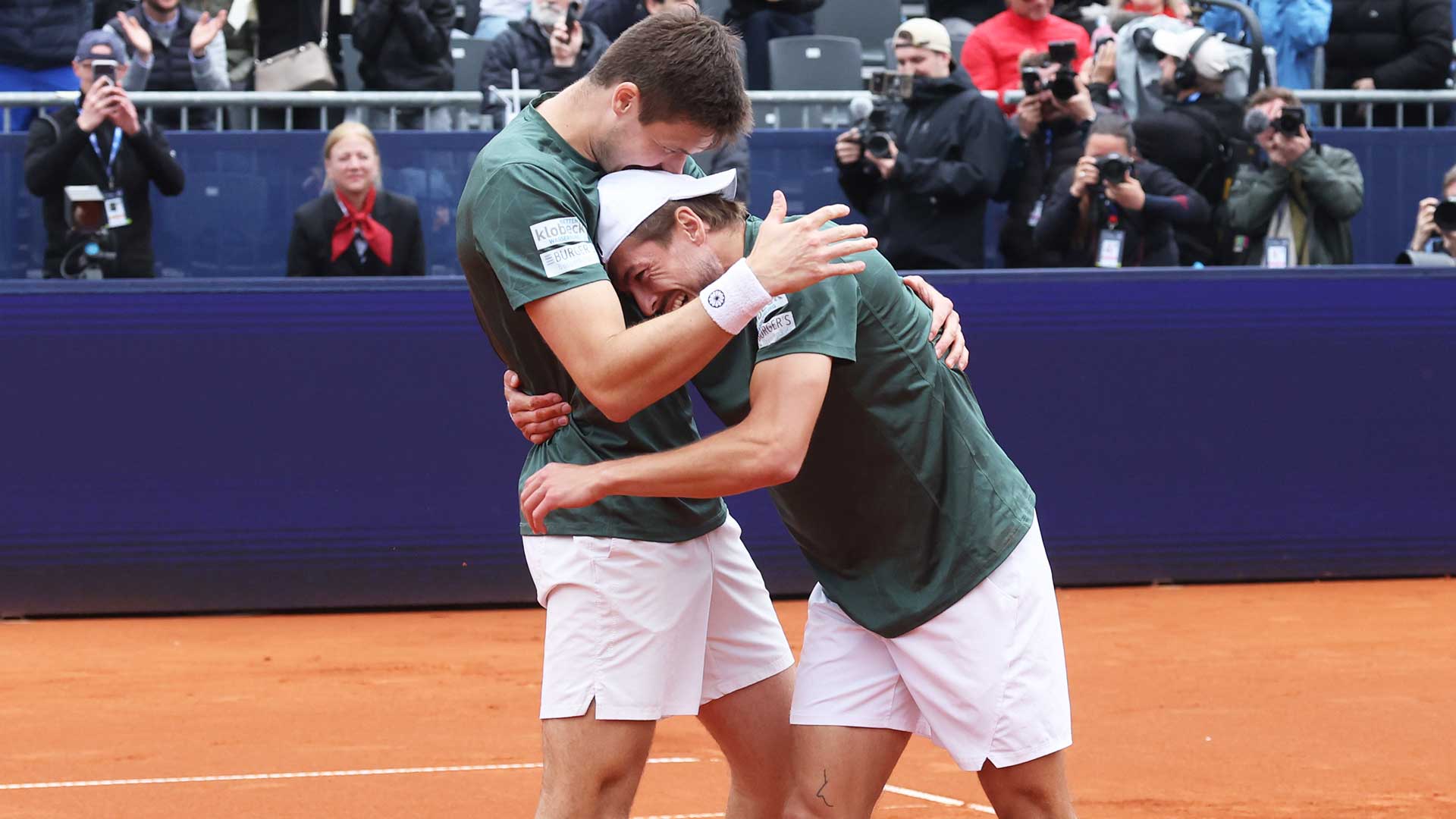 Mark Wallner and Jakob Schnaitter celebrate winning the title in Munich on Sunday.