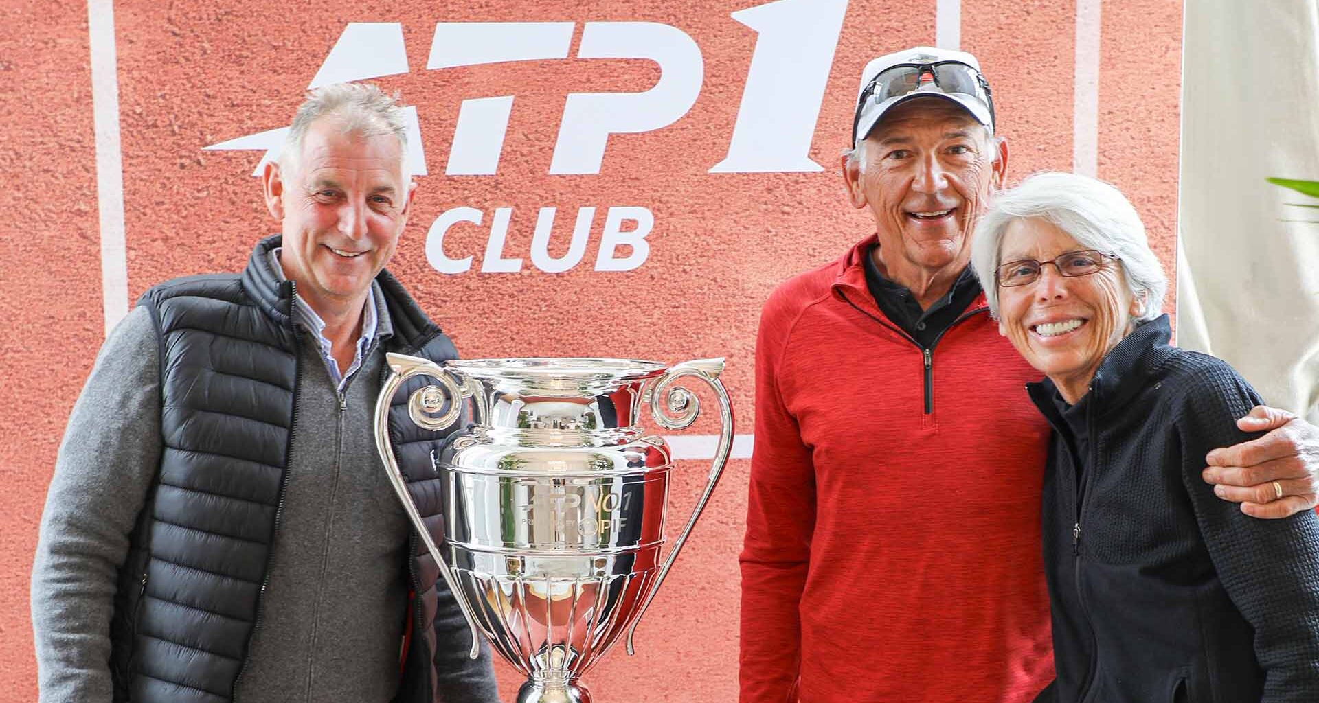Thomas Muster with Ray Sahag and Walker Sahag alongside the ATP Year-end No. 1 presented by PIF trophy.