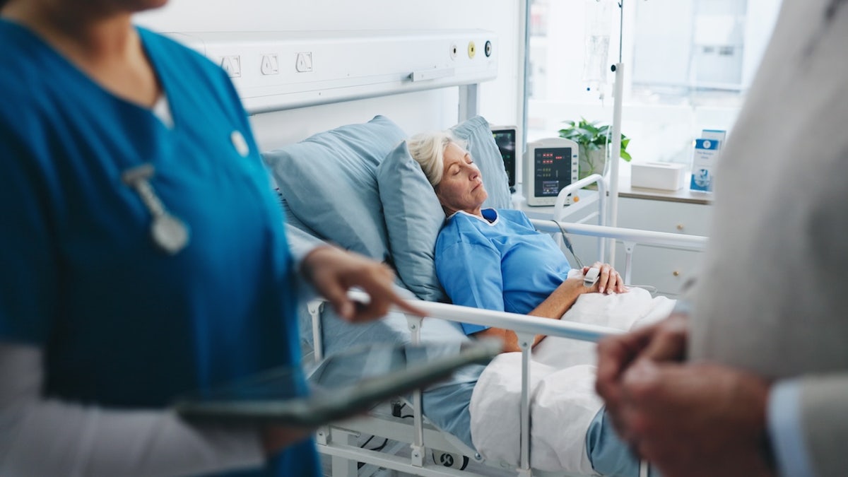 Older woman in hospital treated for infection
