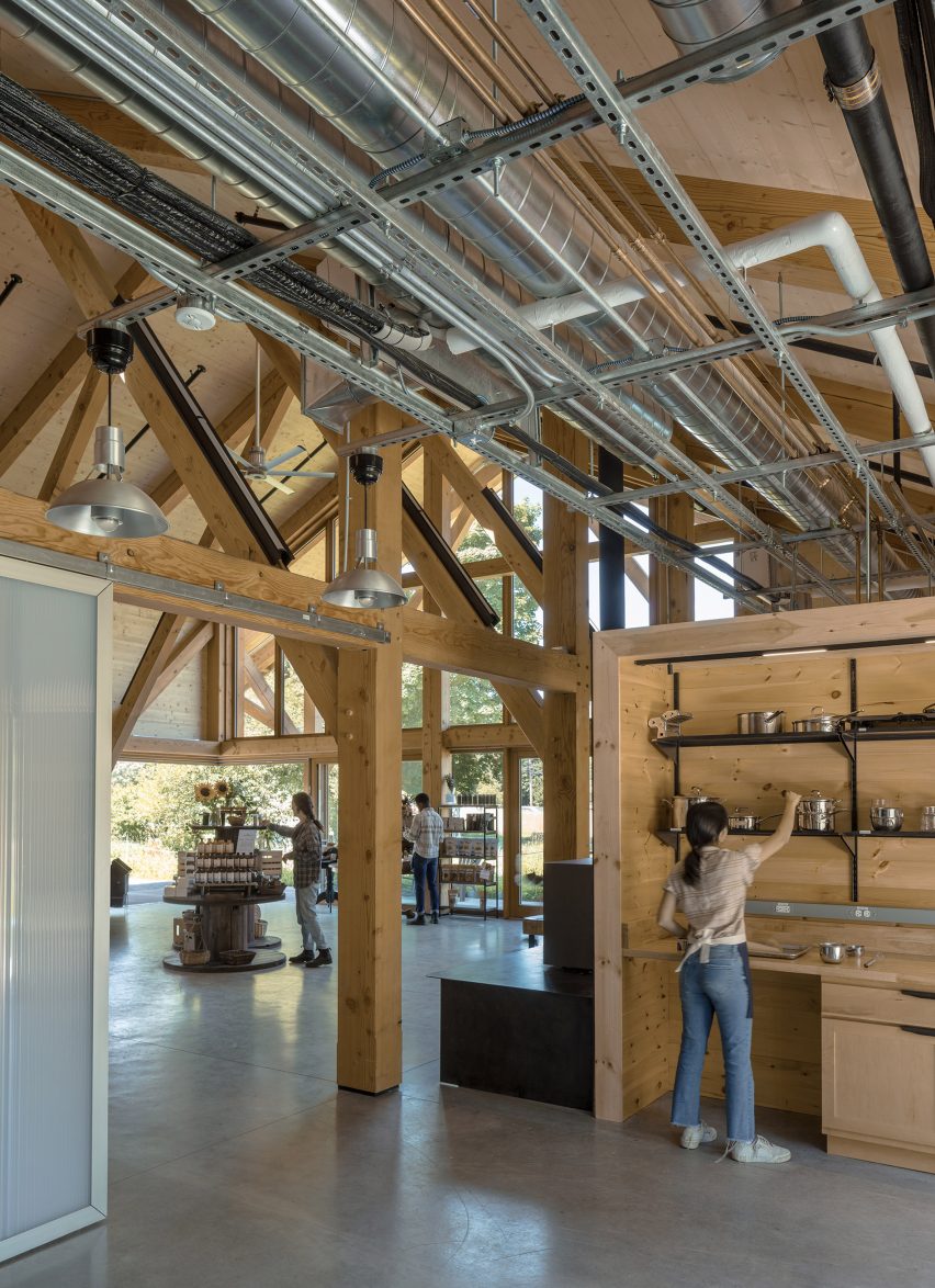 Metal ducting inside of wooden farm stand by Payette