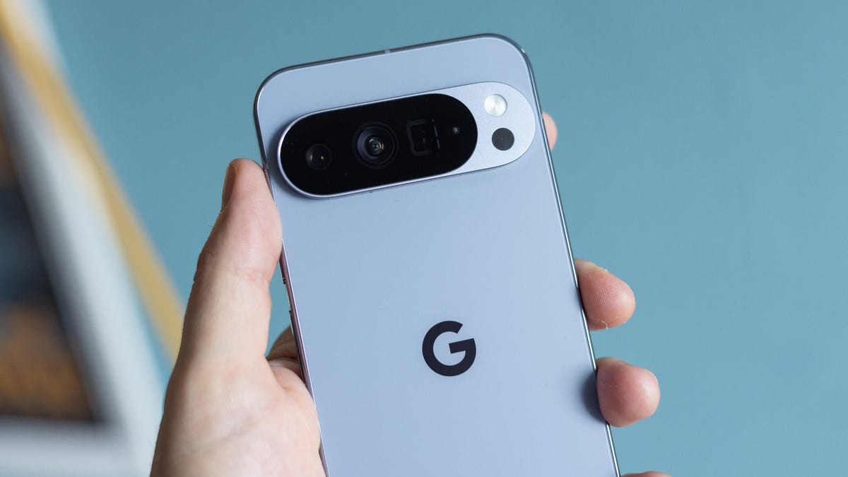 A hand holds a Pixel 10 Pro XL