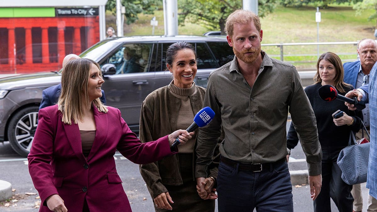 Prince Harry and Meghan Markle arriving at Australian National Veterans Arts Museum in Melbourne