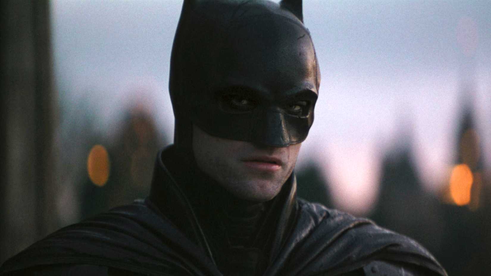 Robert Pattinson's Batman looking at Catwoman at the end of The Batman