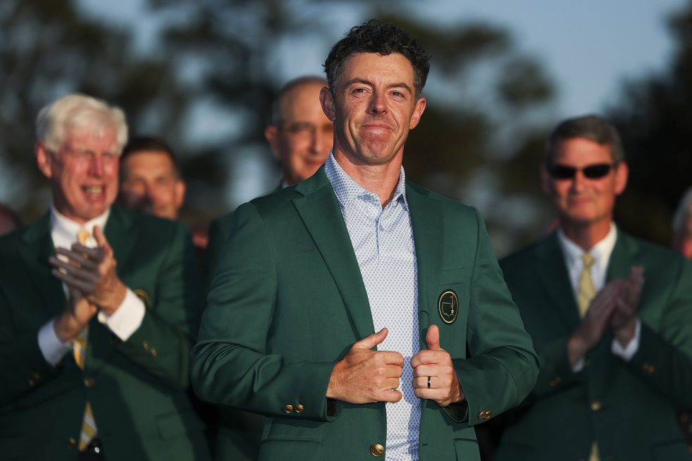Rory McIlroy poses in his green jacket following his Masters win