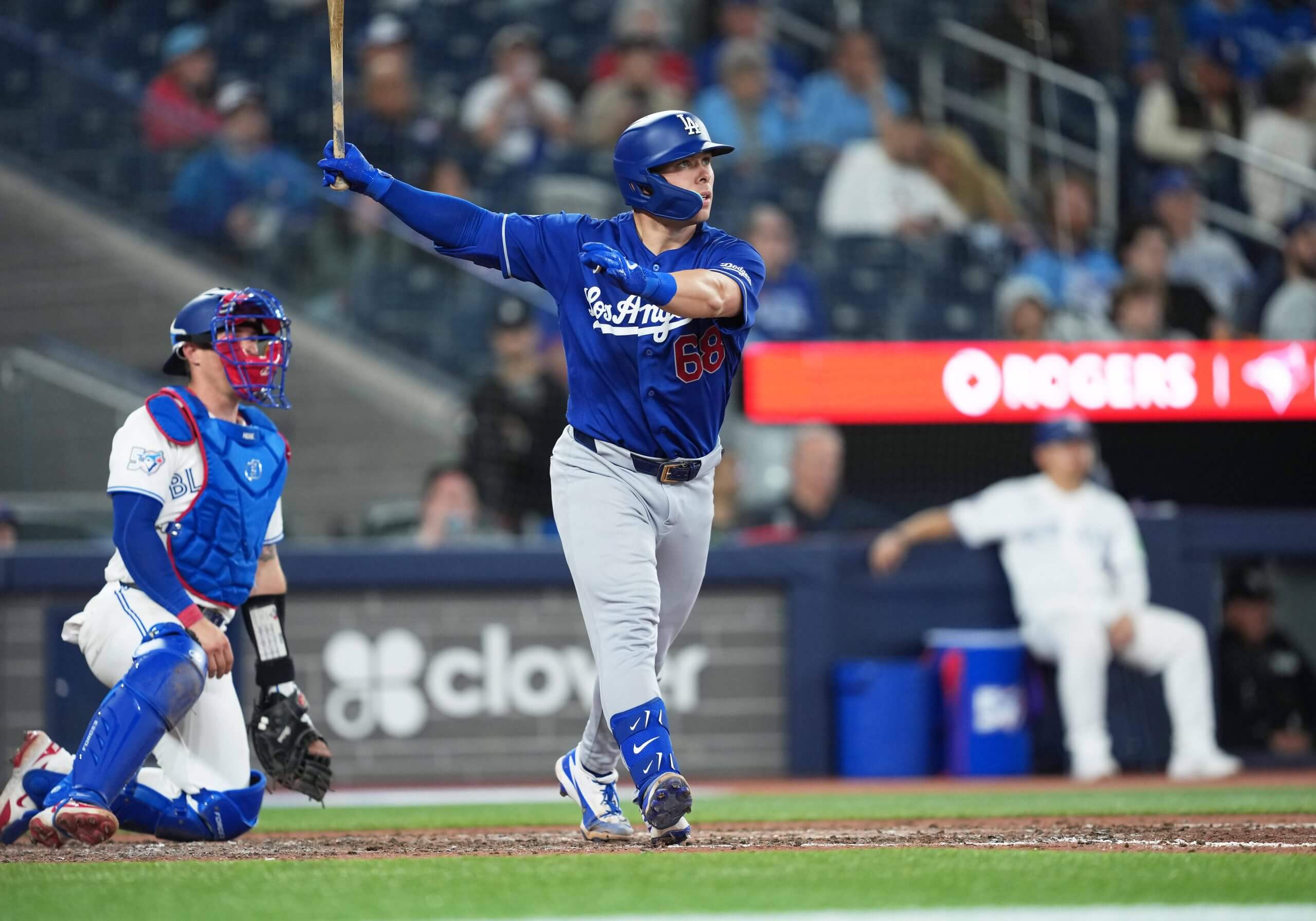 Dodgers catcher Dalton Rushing hits a home run against the Blue Jays on April 6, 2026, in Toronto.