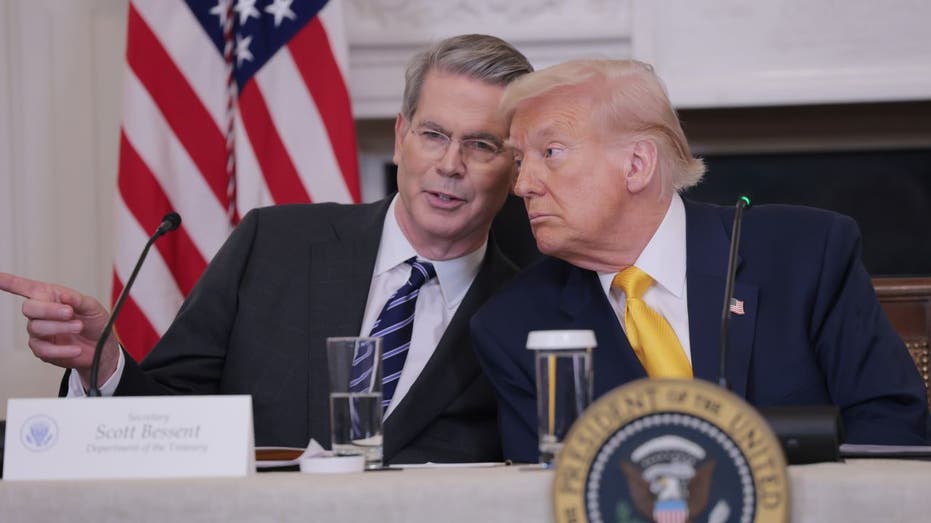 Scott Bessent and Donald Trump at a meeting