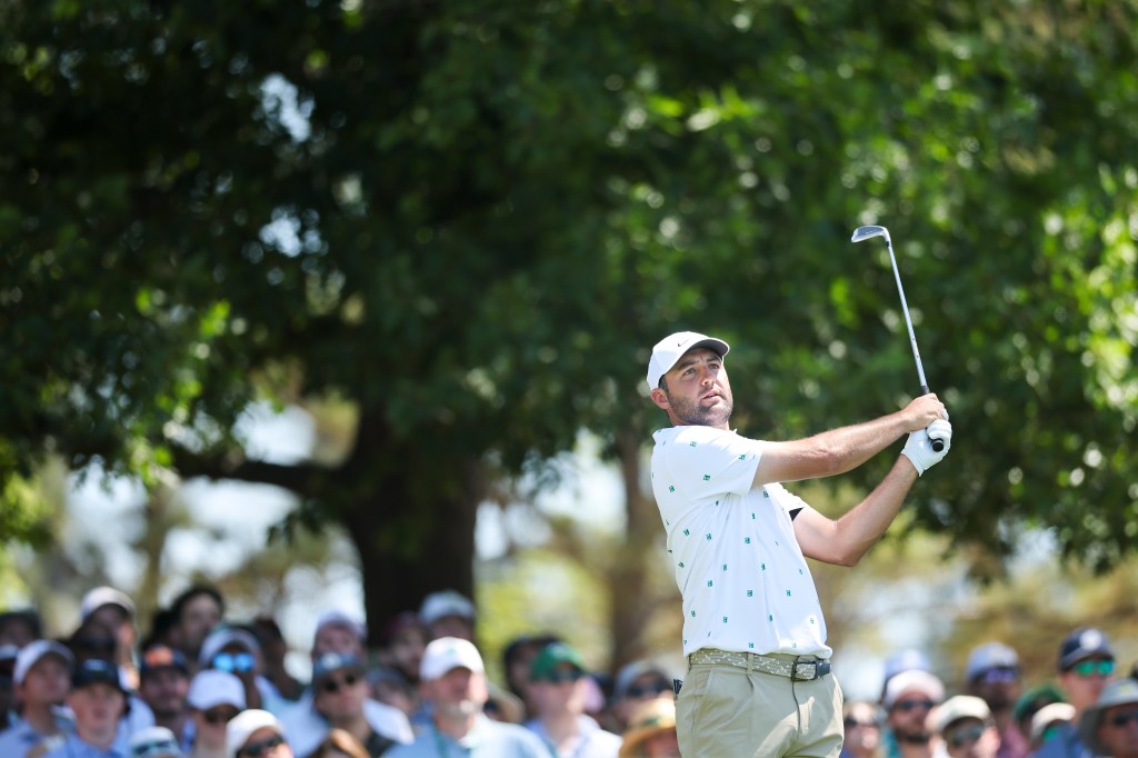Scottie Scheffler plays a shot on the fourth hole during the third round of the Masters on April 11, 2026.