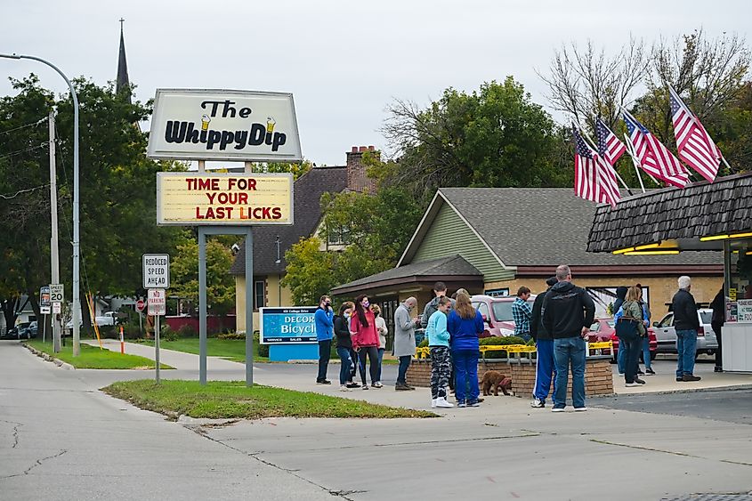 Customers line up for ice cream outside a store in Decorah, Iowa