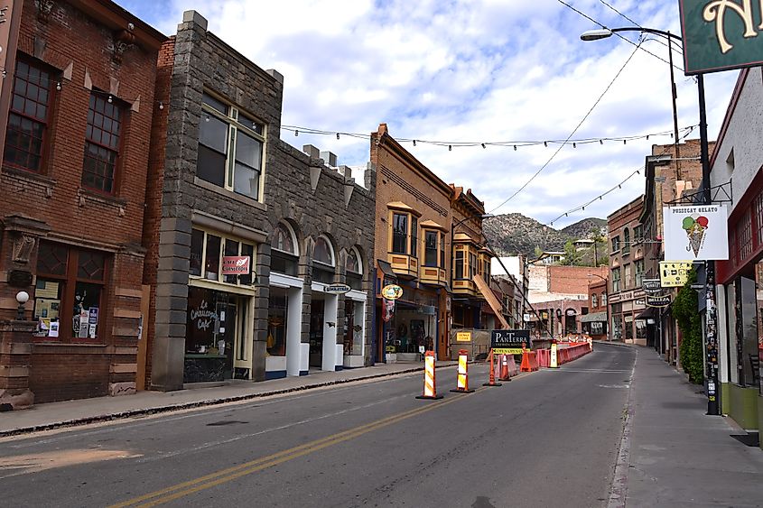 Historic buildings lined along a quaint street in the town of Bisbee, Arizona. 
