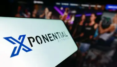 phone shows an Xponential Fitness logo