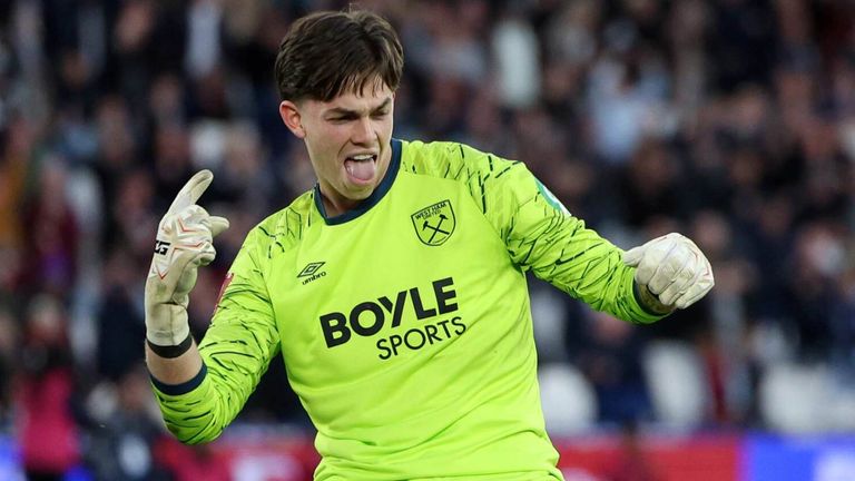 Finlay Herrick celebrates after saving a penalty kick from Joel Piroe