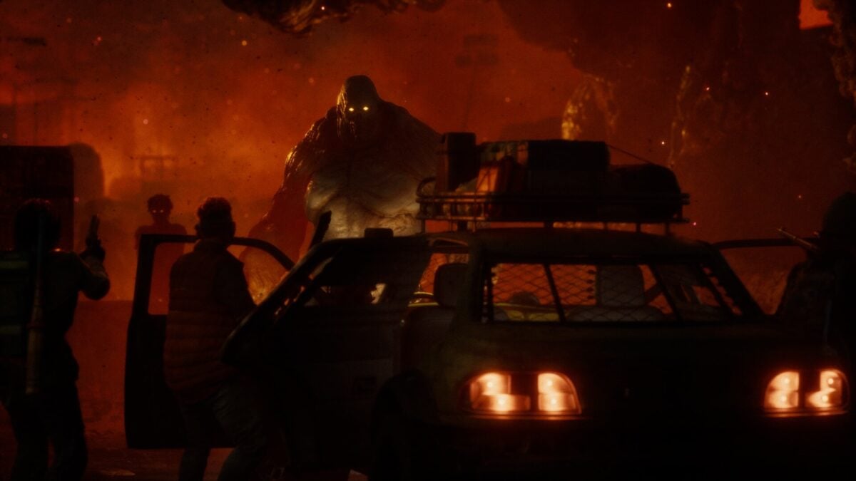 A monster appears in a red smoke.