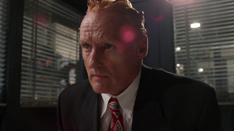 Dennis Hopper looking curious as President 