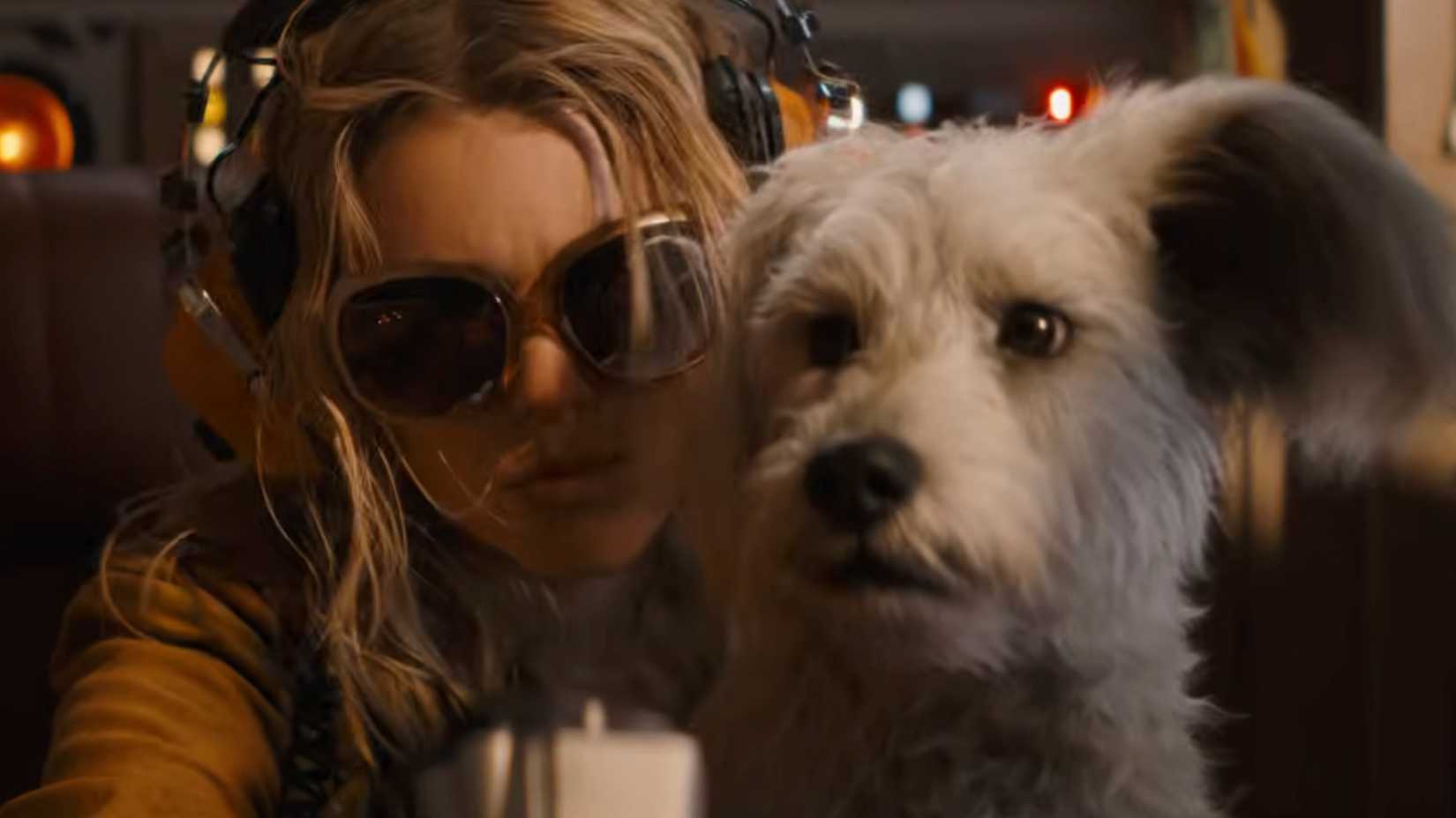 Supergirl and Krypto looking off-screen in Supergirl Trailer